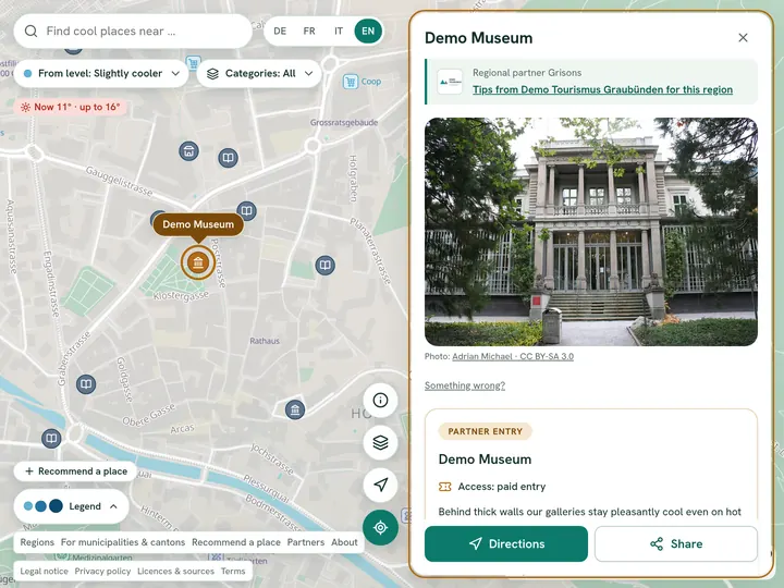 Map with the place panel open: below the title the regional partner's line with logo and link, below that the photo of the place